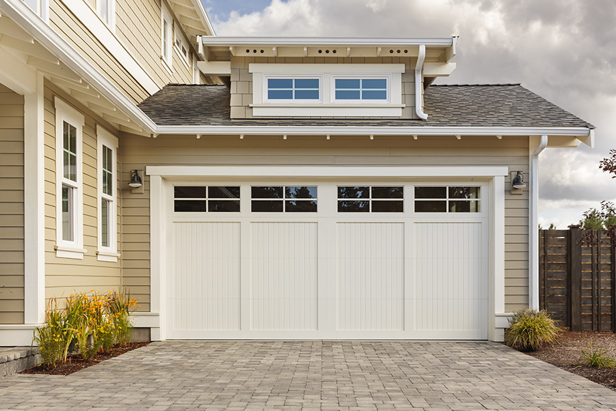 front-house-view-with-white-garage-door-with-windows-mahopac-ny